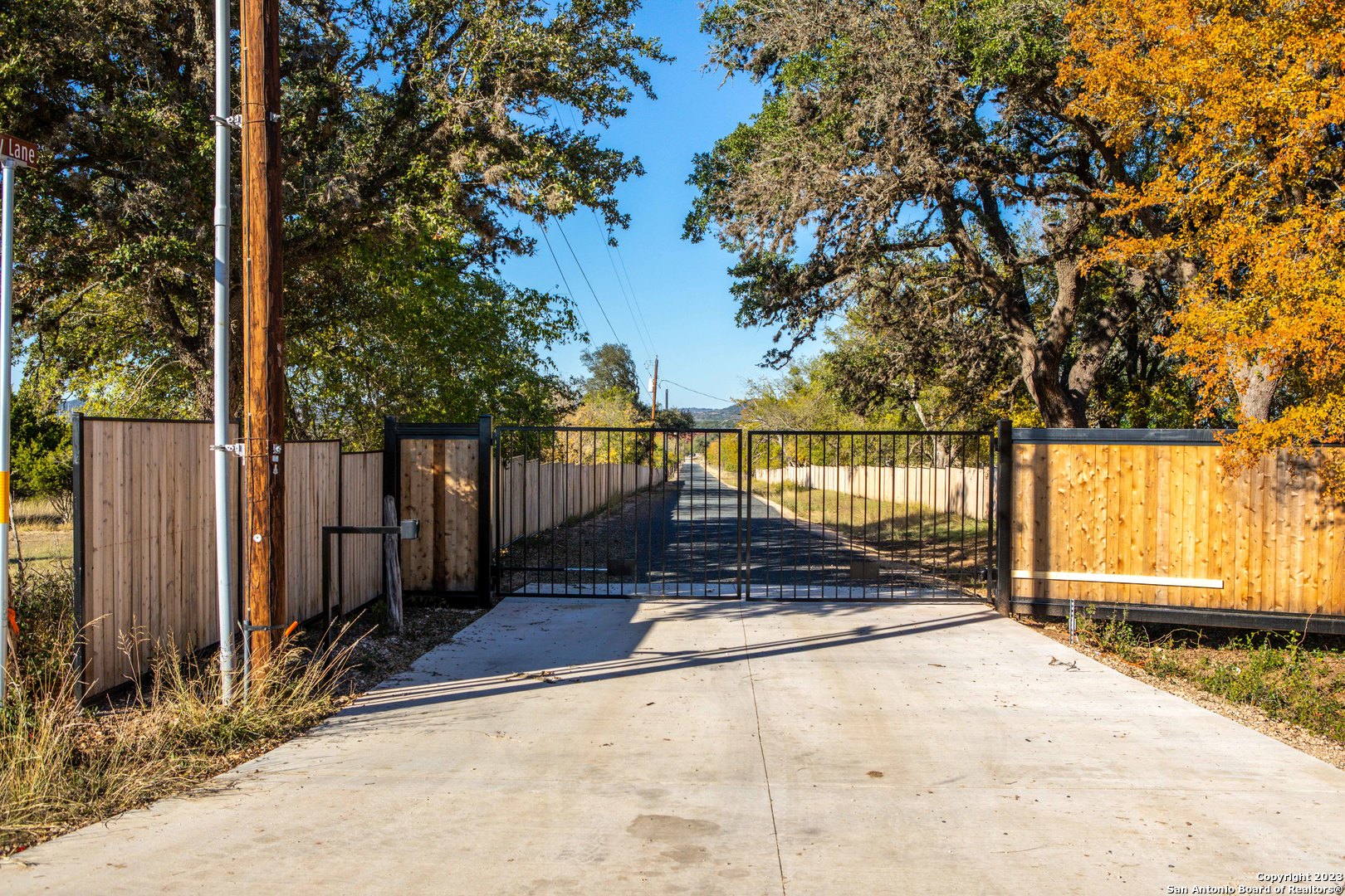 46 Fm 1621 Comfort, TX 78013 - Photo 4 of 48 a view of a pathway of a house with wooden fence