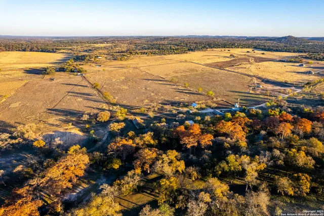 a view of a swimming pool with an outdoor space and seating area