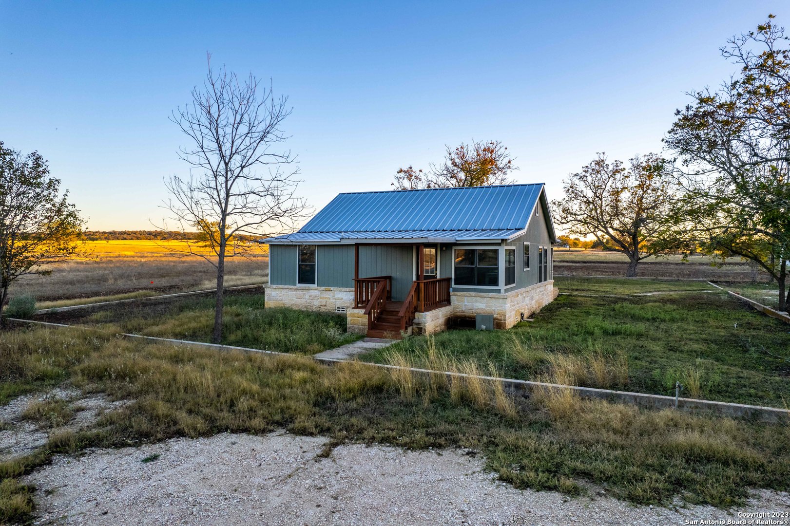 46 Fm 1621 Comfort, TX 78013 - Photo 6 of 48 a front view of a house with garden