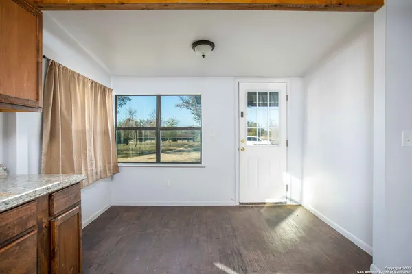 an empty room with windows