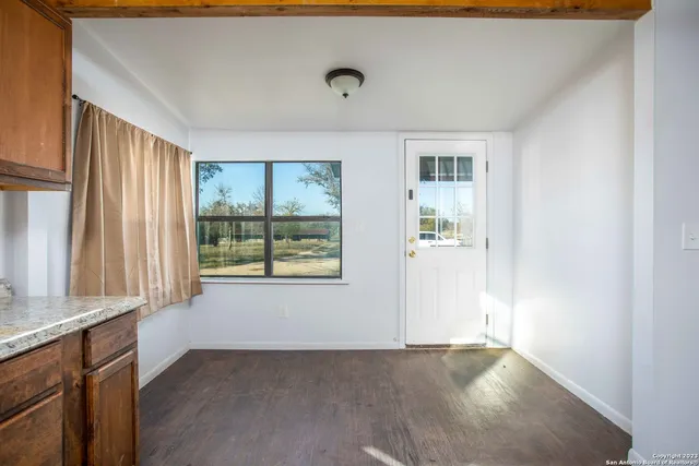 an empty room with windows