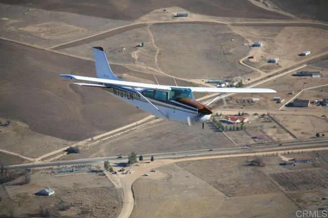 a view of swimming pool with outdoor seating