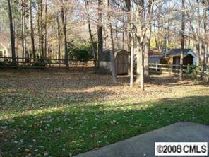 9617 Riddick Place Matthews, NC 28105 - Photo 7 of 8 a view of yard with tree