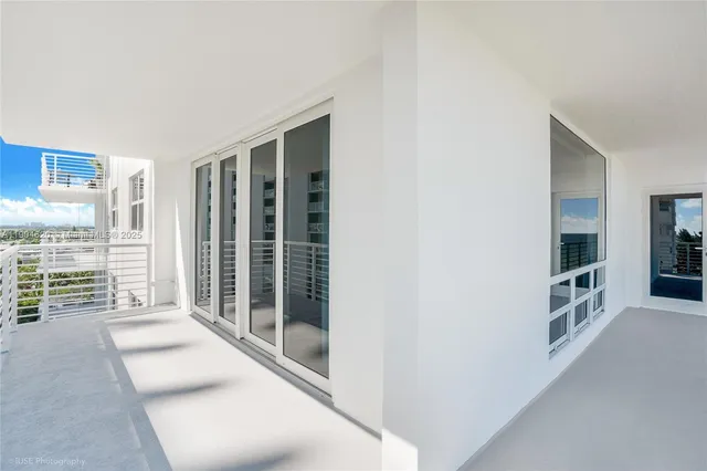 a view of livingroom with furniture and windows