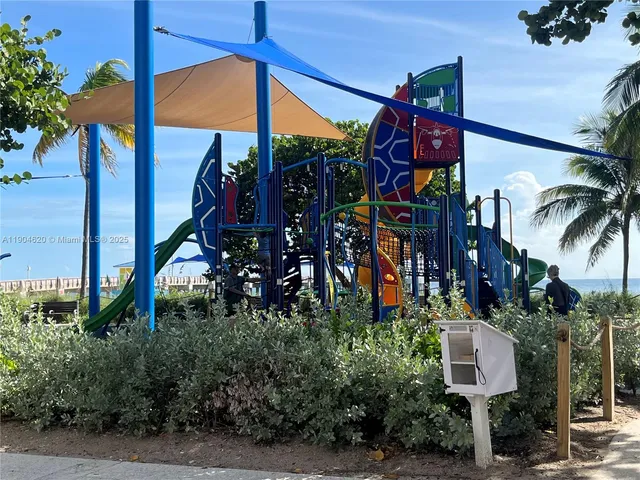 a view of a bench in front of house