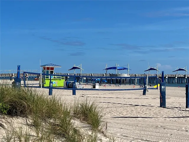 a view of a lake with a big yard