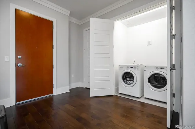 a view of a storage & utility room with washer and dryer