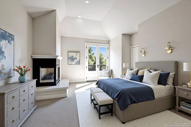 a bedroom with a bed fireplace and windows