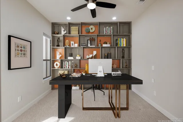 a view of a workspace with furniture