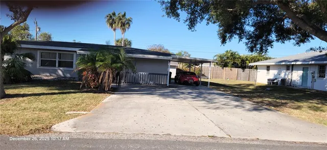 a view of a backyard of the house