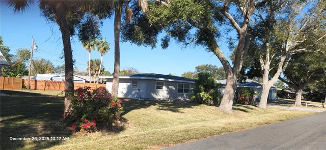 a view of a house with snow yard