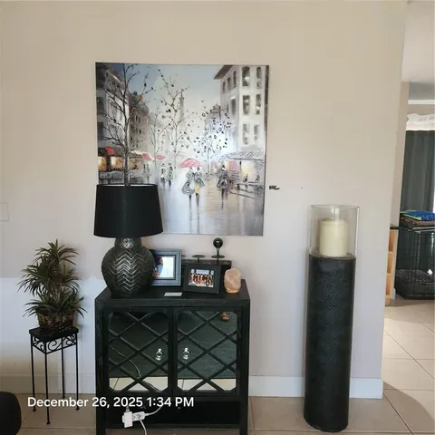 a kitchen with a sink a stove and refrigerator