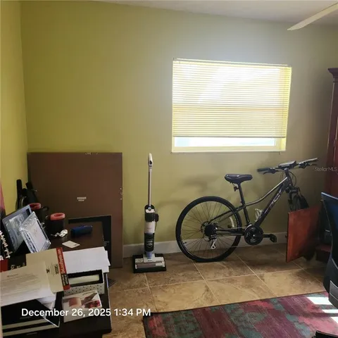 a bathroom with a sink a mirror and a window