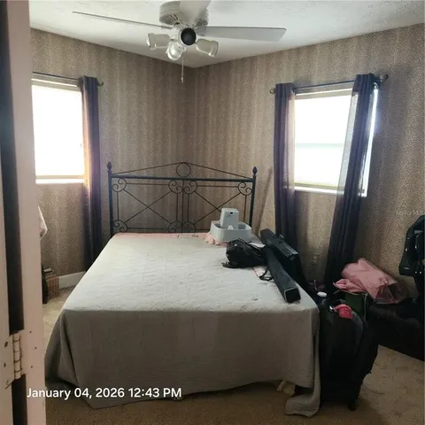 a workspace with furniture and window