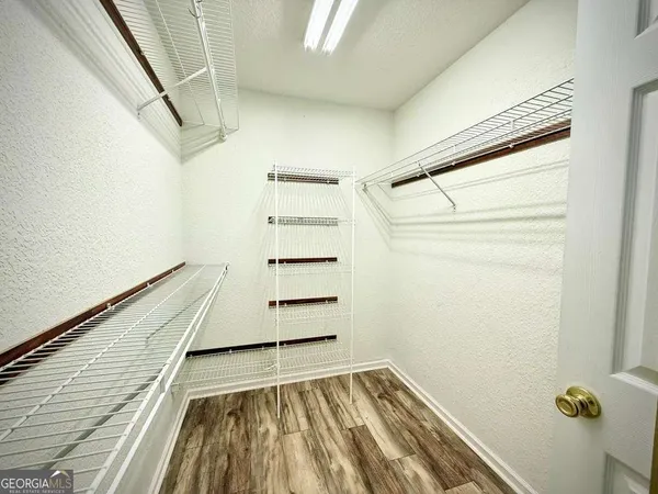 a view of a livingroom with a hardwood floor
