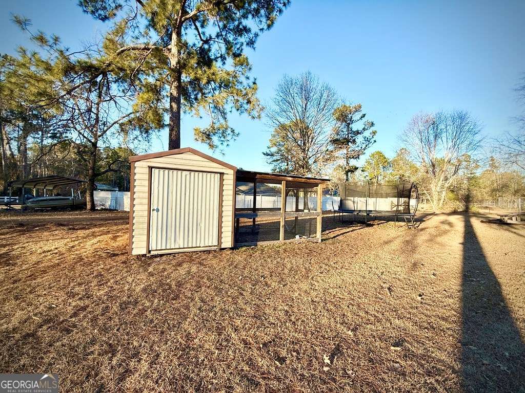 14 Quail Circle Hazlehurst, GA 31539 - Photo 42 of 54 a front view of a house with a yard