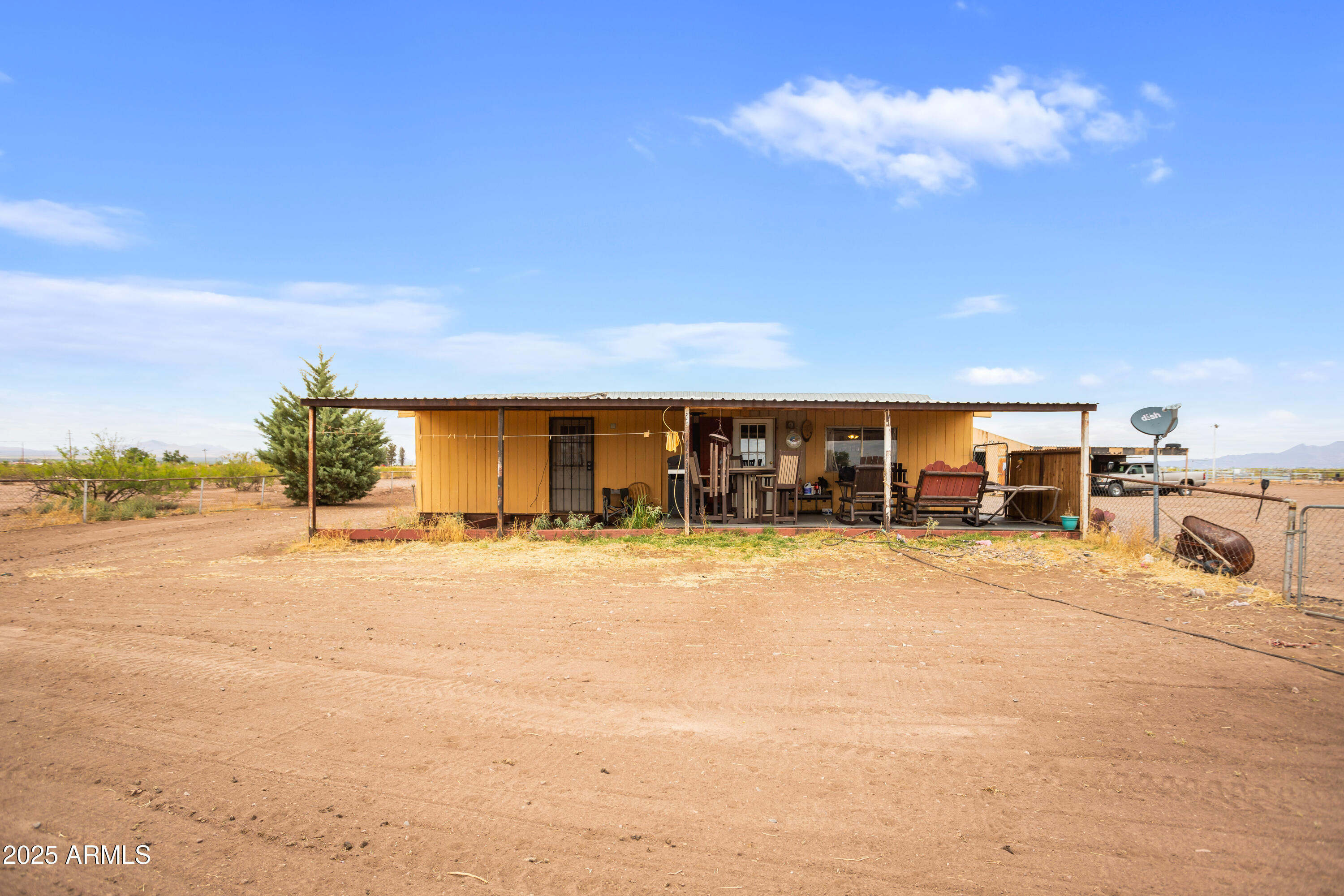 4274 West Lee Road McNeal, AZ 85617 - Photo 19 of 43 a view of a house with basketball court