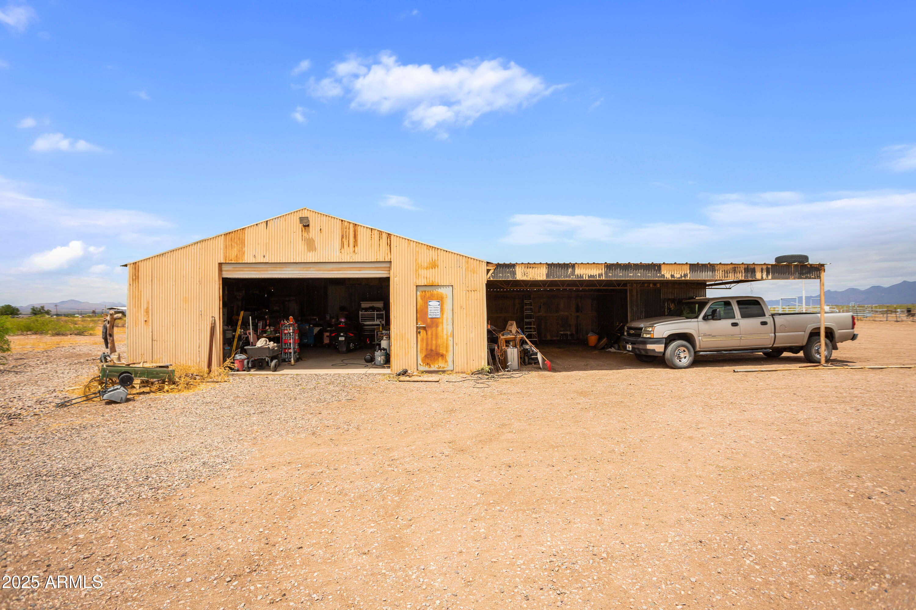 4274 West Lee Road McNeal, AZ 85617 - Photo 27 of 43 a view of a car park in front of a house