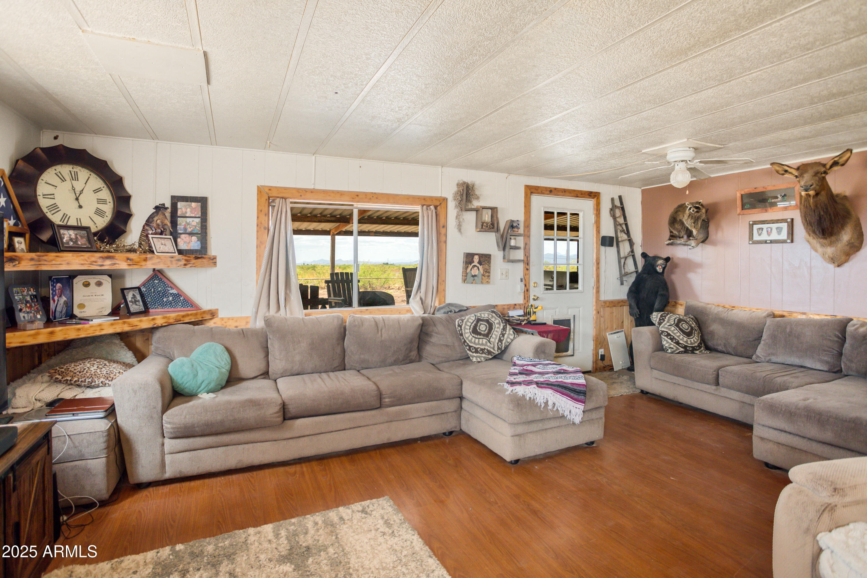 4274 West Lee Road McNeal, AZ 85617 - Photo 3 of 43 a living room with furniture and a large window