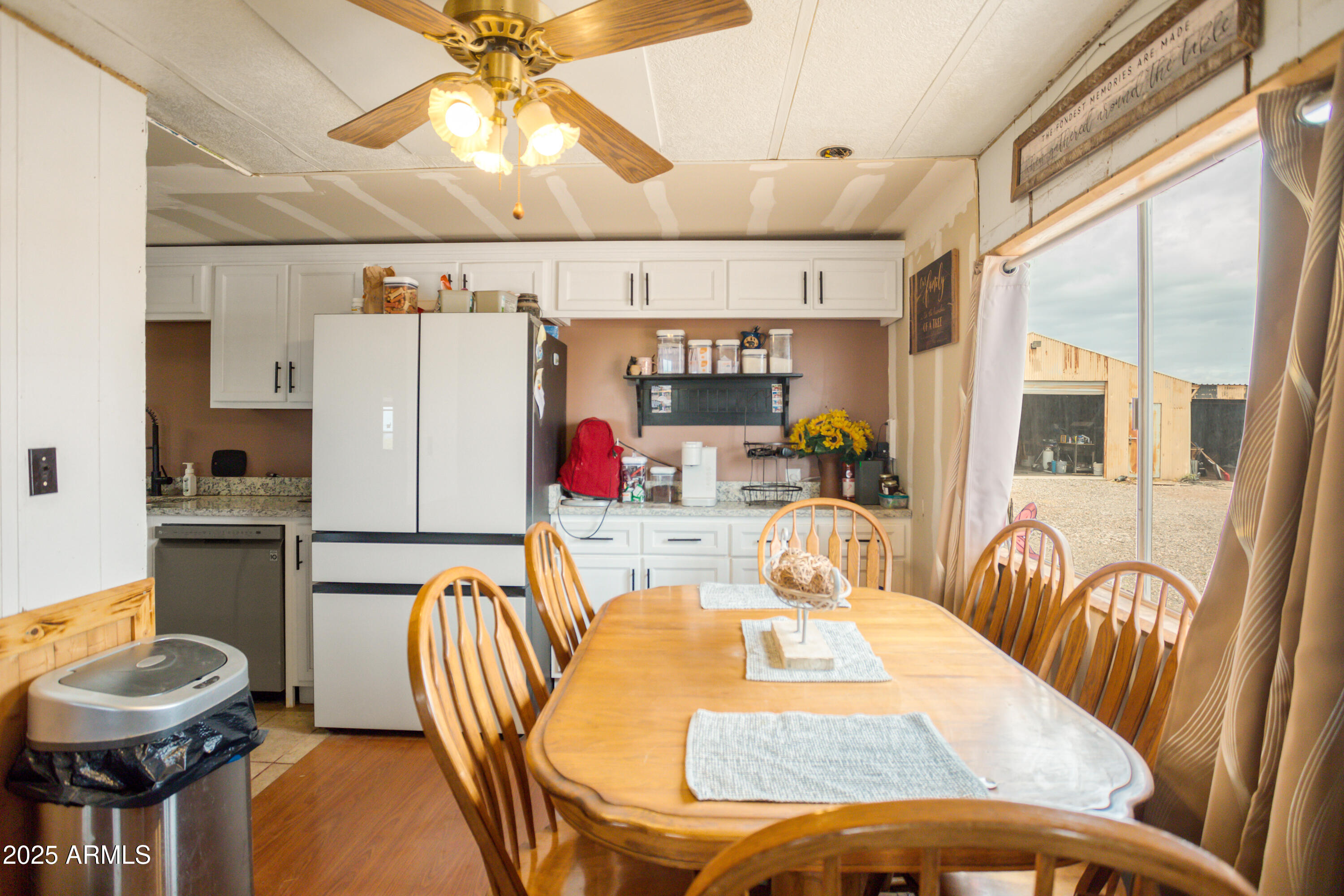 4274 West Lee Road McNeal, AZ 85617 - Photo 4 of 43 a dining room with furniture and a chandelier