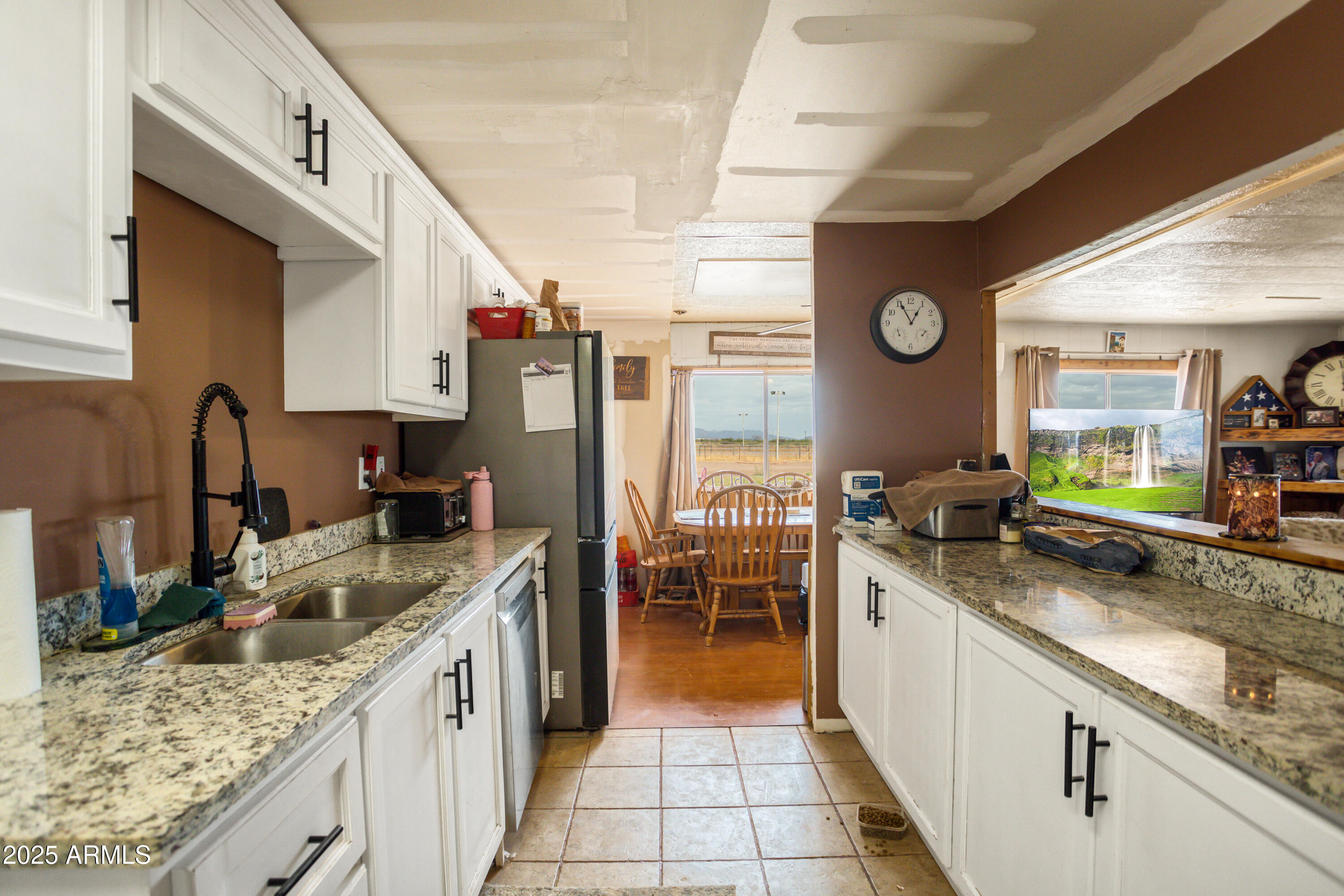 4274 West Lee Road McNeal, AZ 85617 - Photo 7 of 43 a kitchen with granite countertop lots of counter top space and stainless steel appliances