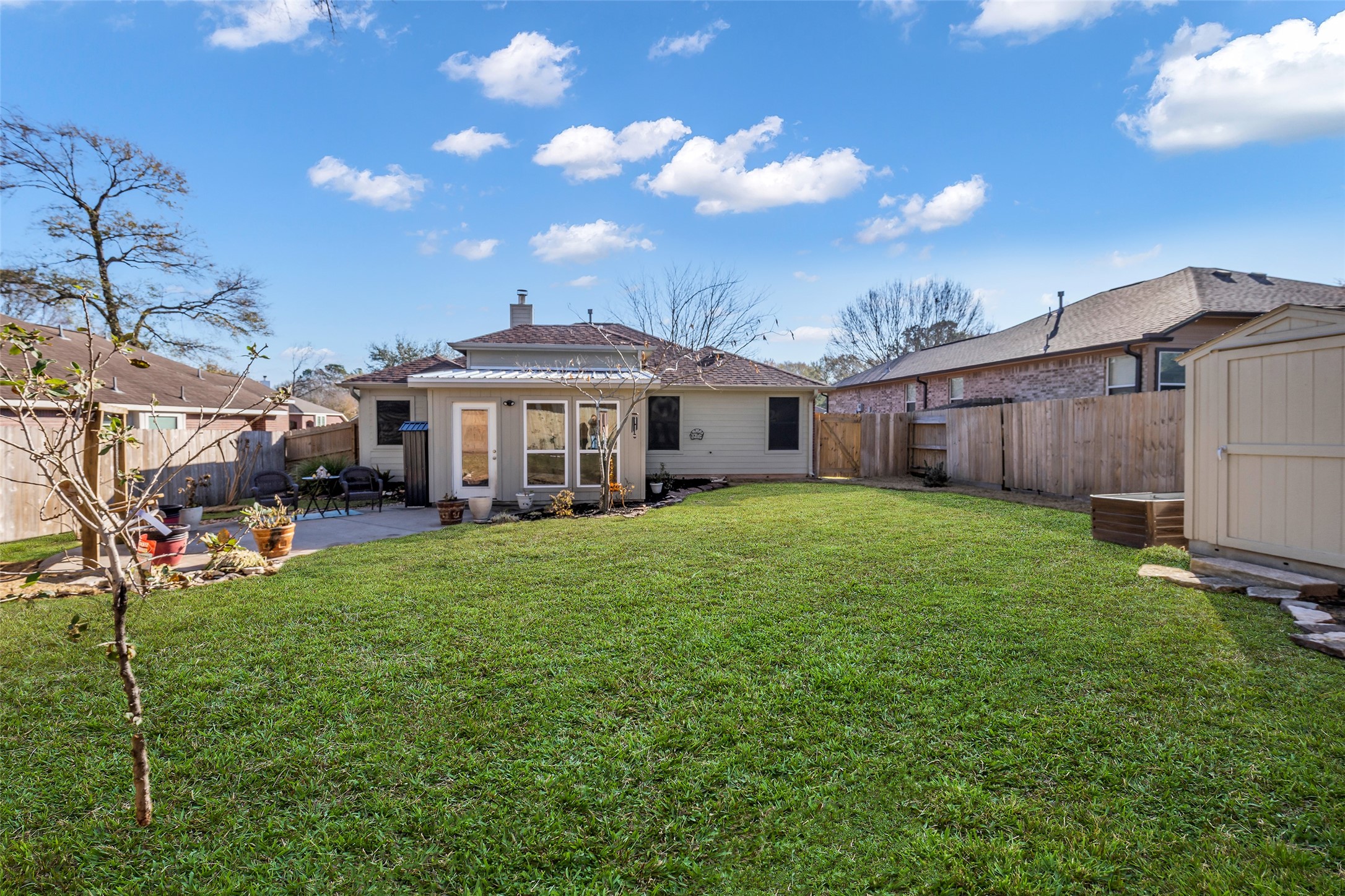 242 Sunset Path North Conroe, TX 77316 - Photo 35 of 37 Another view of this spacious back yard! So many possibilities!! 242 SUNSET PATH N - Request your tour today!