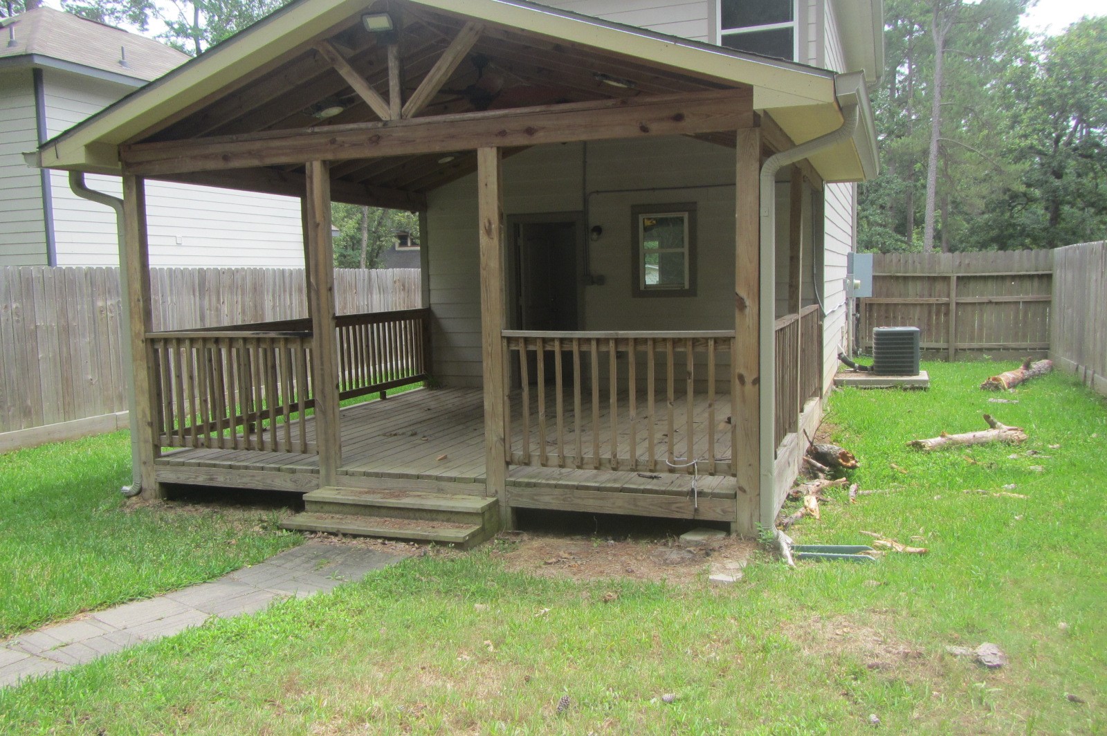 28612 Netawake Court Point Blank, TX 77364 - Photo 2 of 14 a view of backyard with a deck