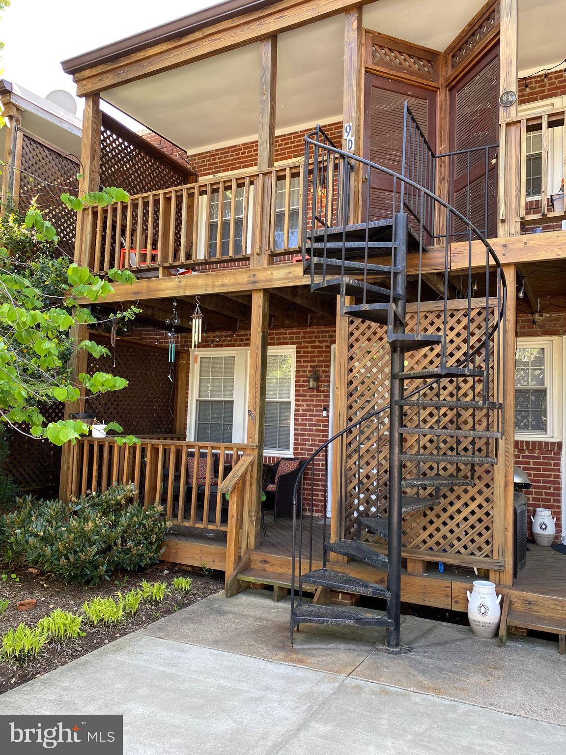 9 Russell Road, Unit D Alexandria, VA 22301 - Photo 4 of 29 a view of a house with a deck