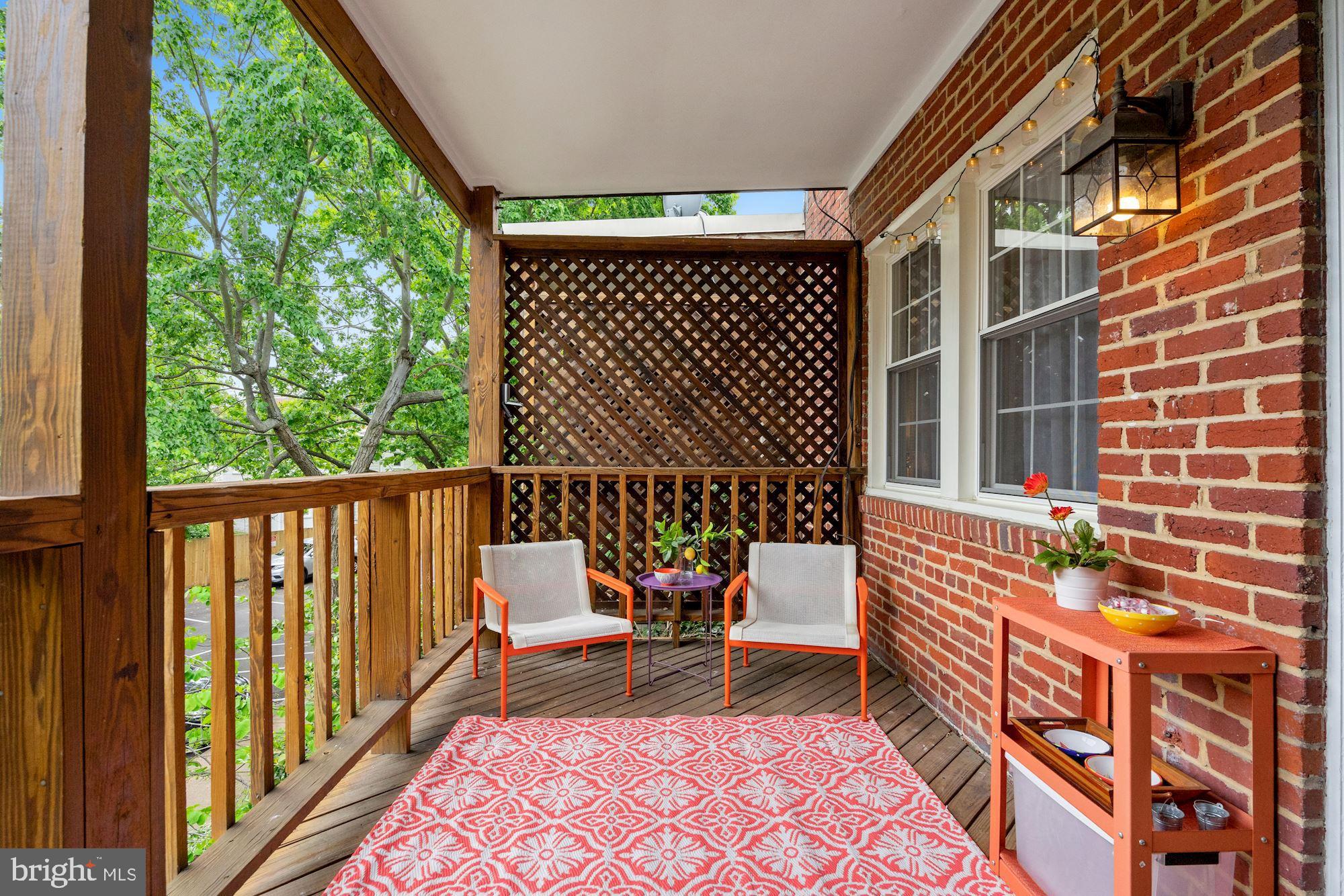 9 Russell Road, Unit D Alexandria, VA 22301 - Photo 6 of 29 a balcony view with a bench