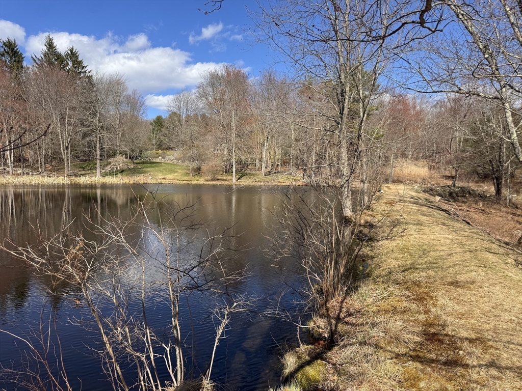 45 Sessions Road Hardwick, MA 01037 - Photo 24 of 28 a view of a lake with a yard