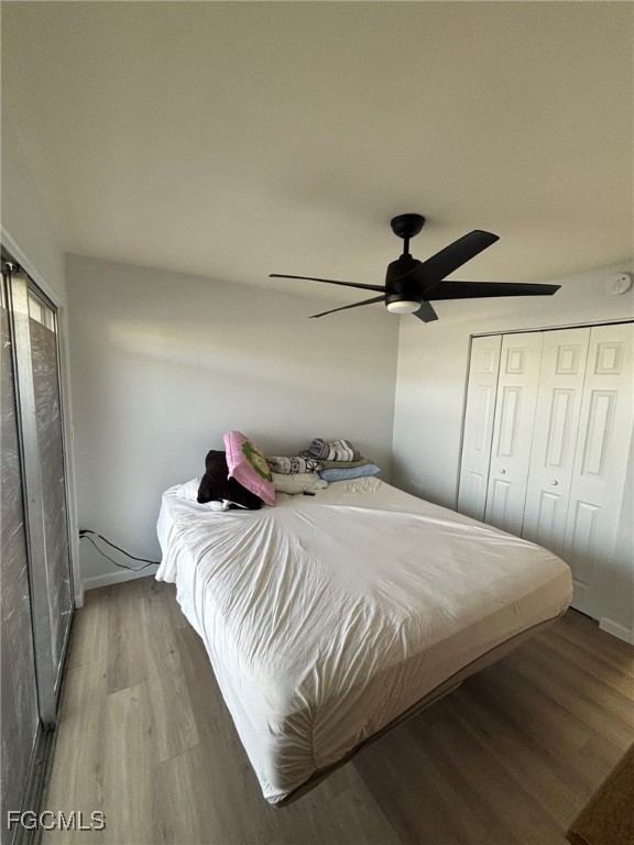 5713 Foxlake Drive, Unit 4 North Fort Myers, FL 33917 - Photo 8 of 13 a bedroom with a bed and a window