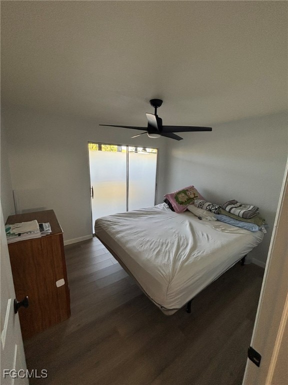 5713 Foxlake Drive, Unit 4 North Fort Myers, FL 33917 - Photo 10 of 13 a bedroom with a bed and window