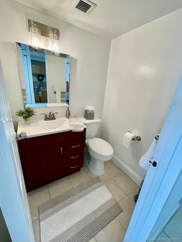 a bathroom with a sink and a shower