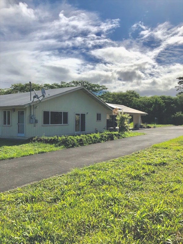 769 Ahuna Road Hilo, HI 96720 - Photo 2 of 21 a view of a house with a yard