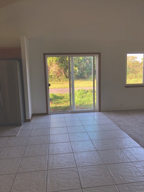 769 Ahuna Road Hilo, HI 96720 - Photo 9 of 21 a view of an empty room with a window