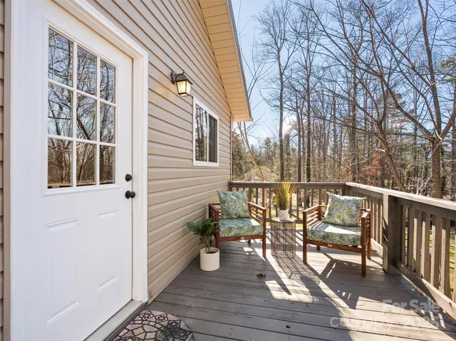 a view of balcony with chairs