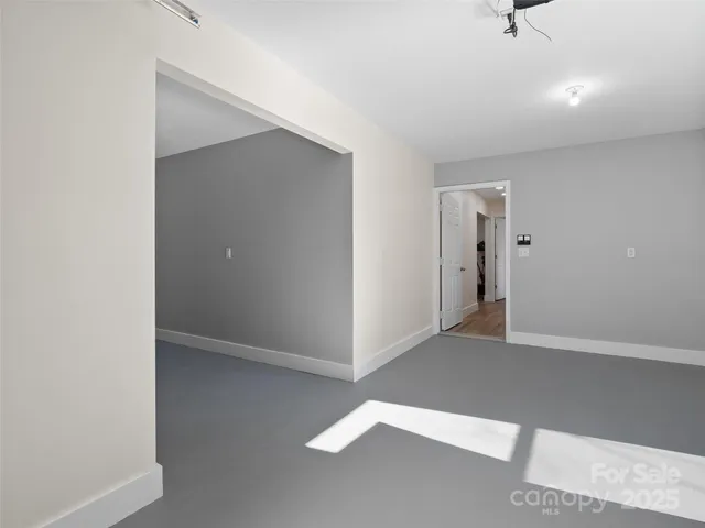 a view of a livingroom with a bed