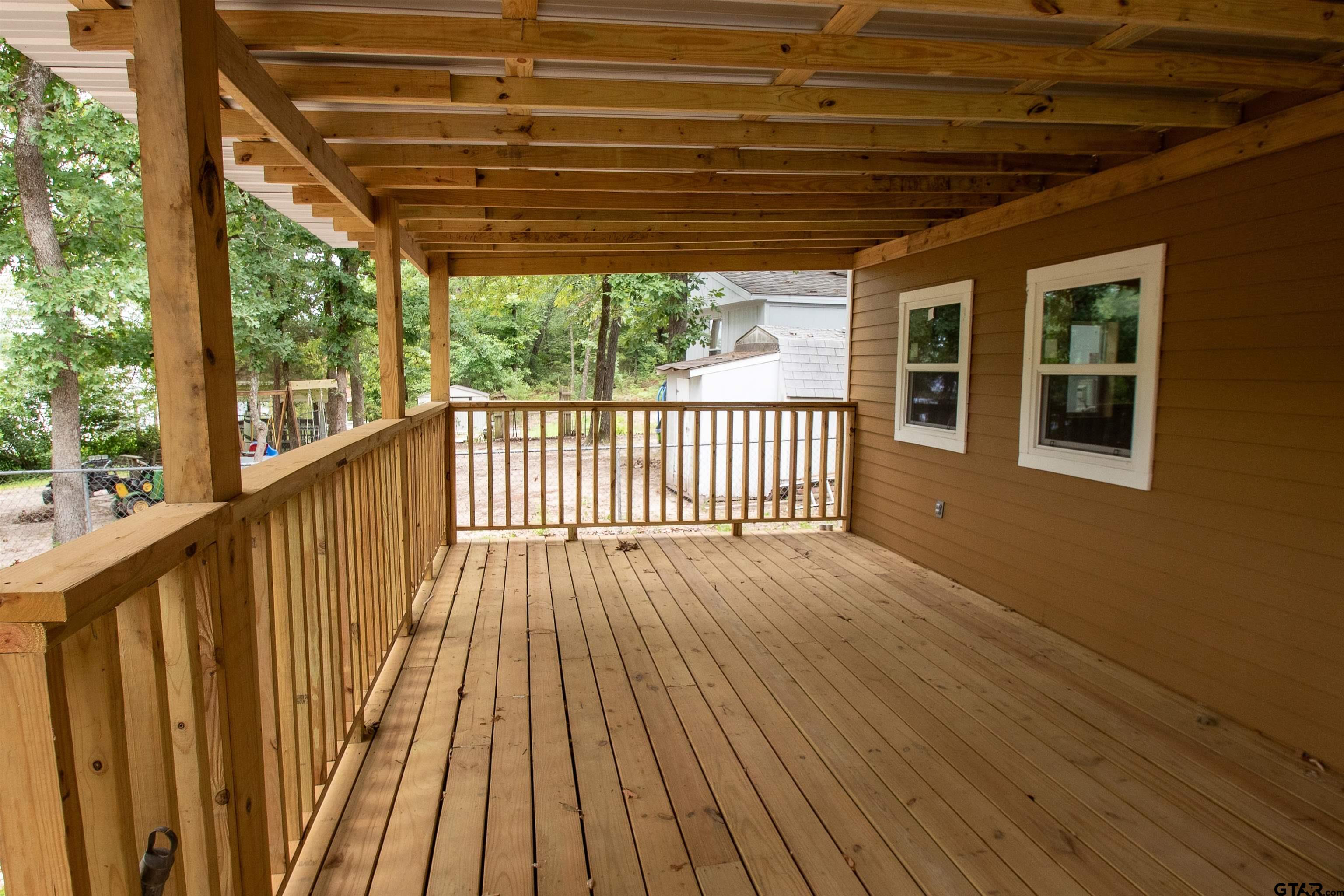 111 Ridgewood Lane Murchison, TX 75778 - Photo 8 of 42 Large back porch
