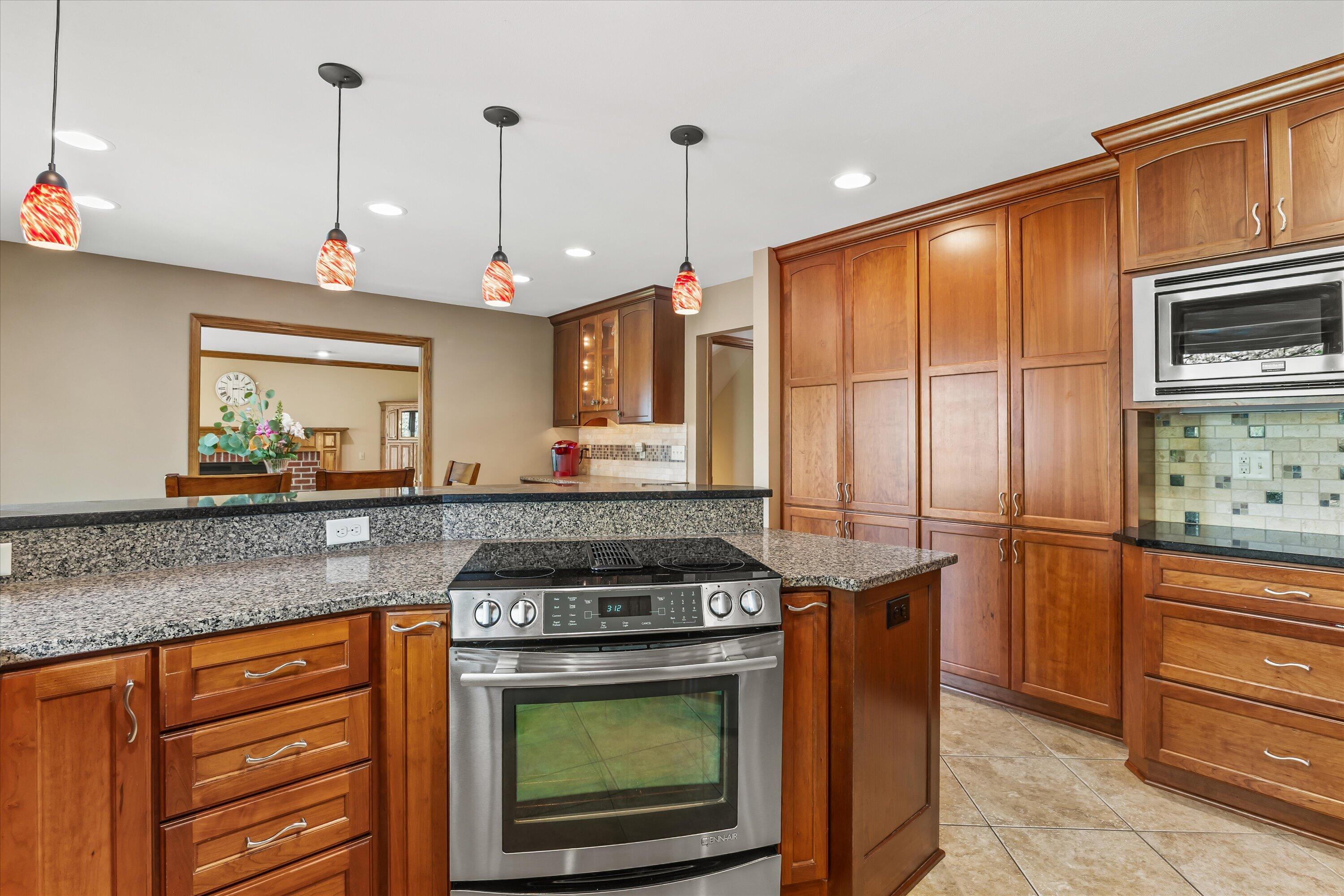 W168N5140 Stonefield Road Menomonee Falls, WI 53051 - Photo 8 of 49 Granite counters, updated cabinetry