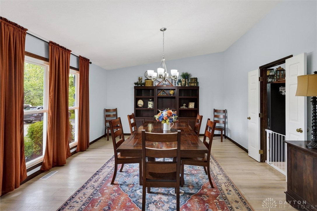 2165 Stewart Road Xenia, OH 45385 - Photo 6 of 59 This dining room offers a warm ambiance, perfect for intimate gatherings or celebratory meals.