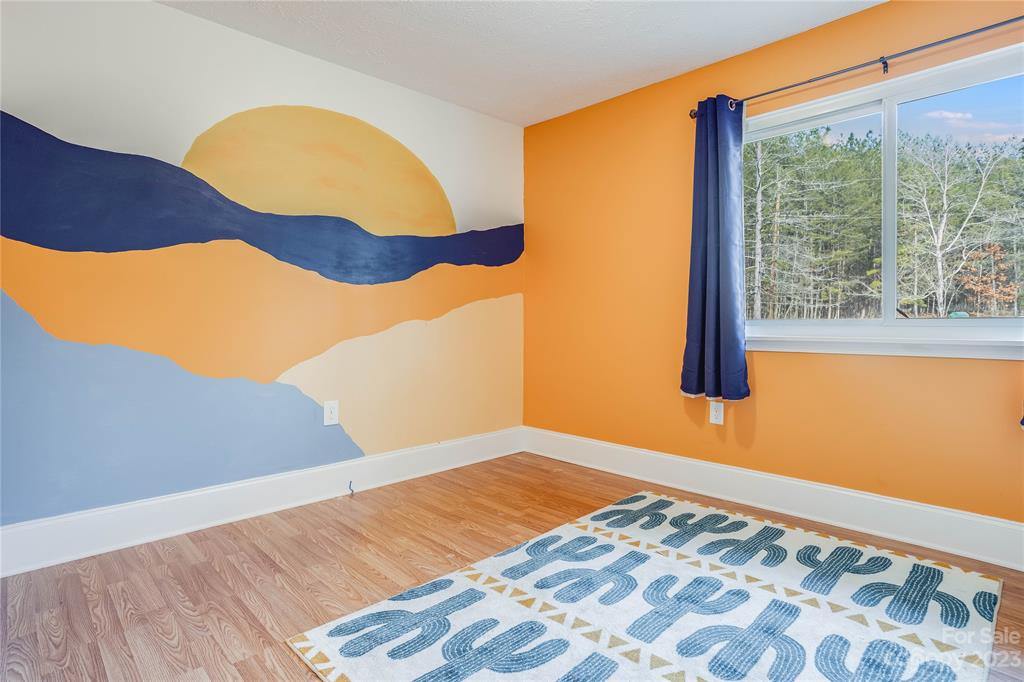 237 Diana Road Cherryville, NC 28021 - Photo 12 of 18 a view of a room with wooden floor and a cabinet
