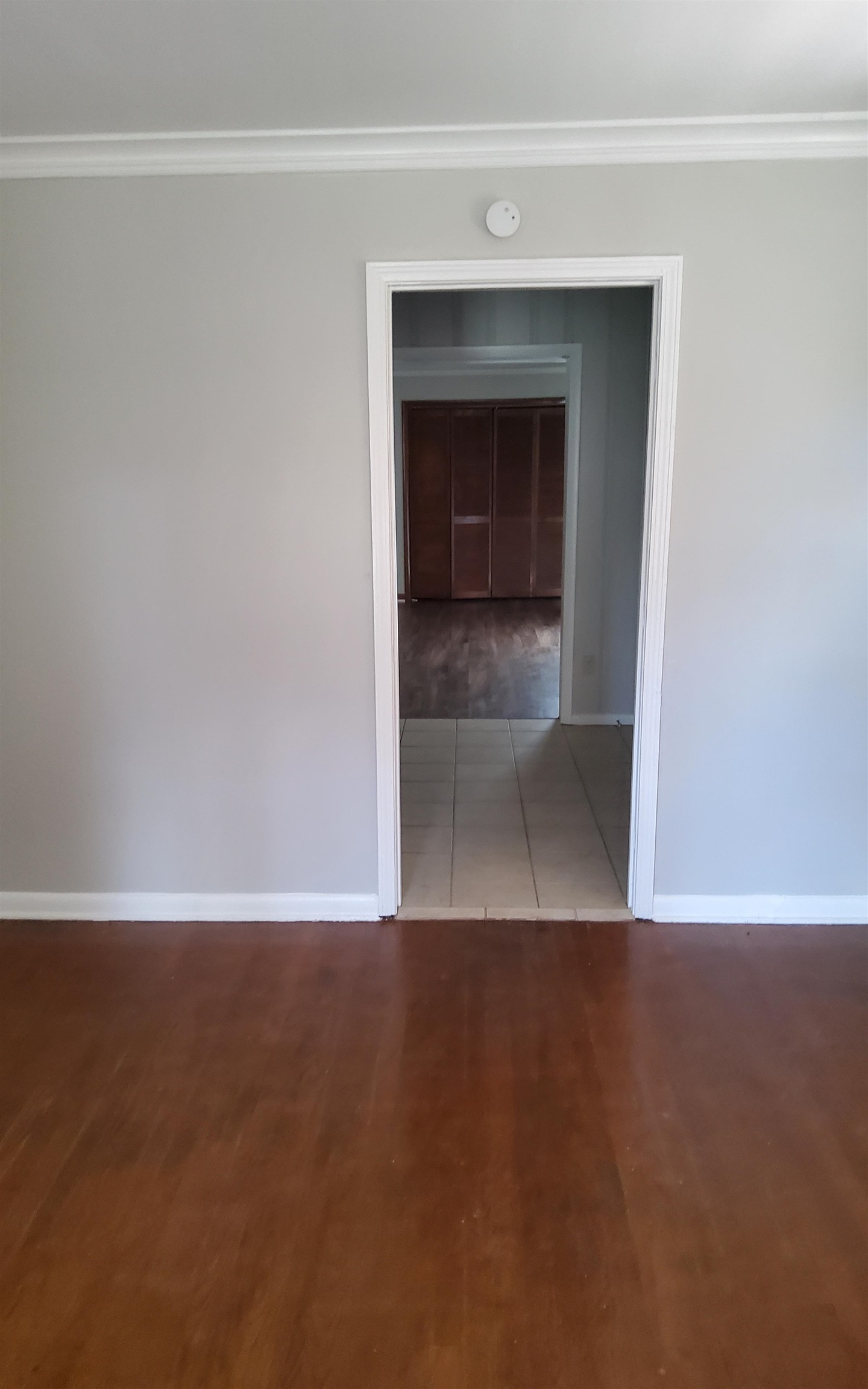 3954 Kenosha Road Memphis, TN 38118 - Photo 5 of 8 Spare room with ornamental molding and hardwood / wood-style floors
