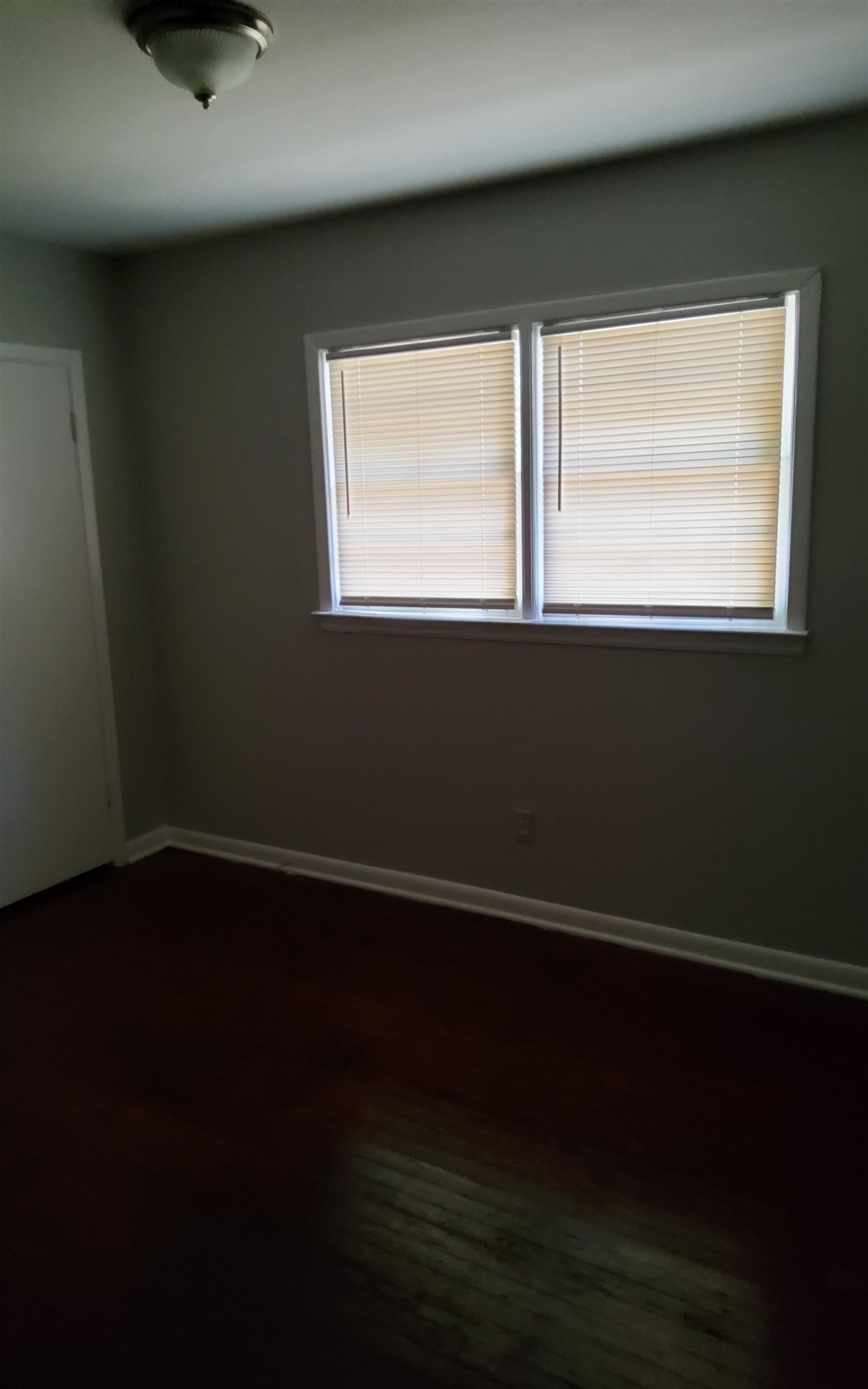 3954 Kenosha Road Memphis, TN 38118 - Photo 8 of 8 Empty room with dark hardwood / wood-style floors