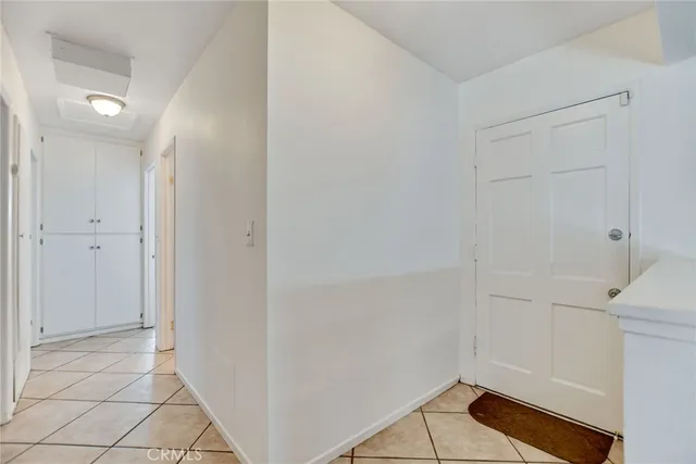 a living room with furniture fireplace and window