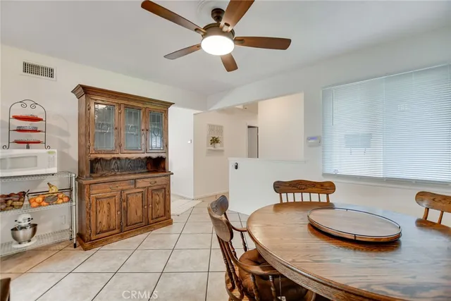 a room with furniture and white walls
