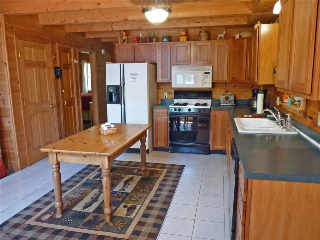 75 Brooks And Dunn Road Otis, ME 04605 - Photo 11 of 35 To the left is pantry door and...