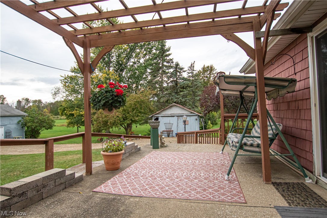 3946 Poe Road Medina, OH 44256 - Photo 28 of 35 View of patio / terrace with a storage unit and a pergola