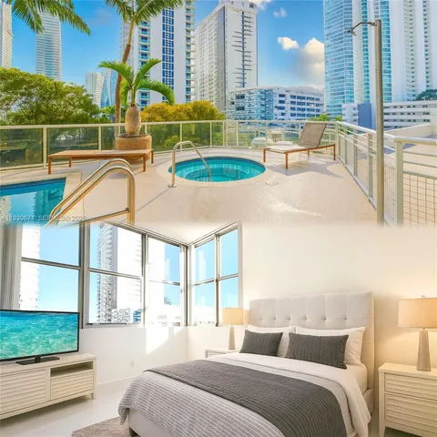 a large room with a large window and furniture