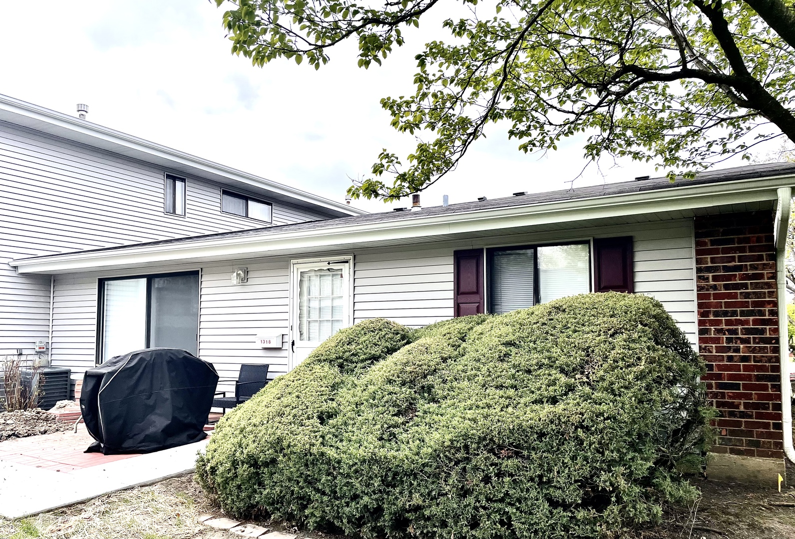 a house view with a outdoor space