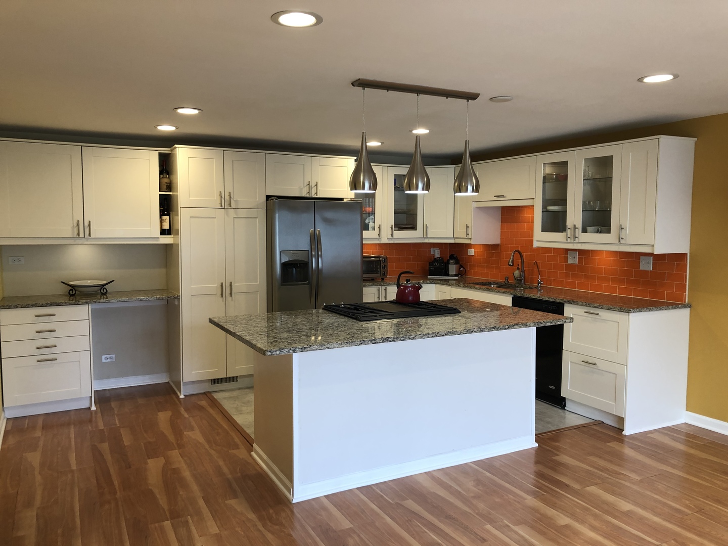 Undisclosed Address Schaumburg, IL 60193 - Photo 3 of 10 a kitchen with stainless steel appliances granite countertop a sink and a stove top oven